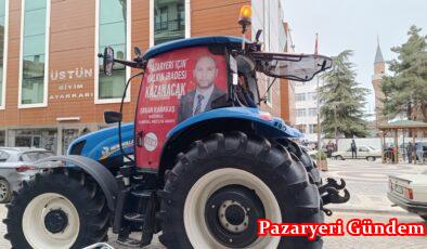 Kooperatifi başkanı aday olduğu yerel seçimlerde traktörünü seçim arabası yaptı